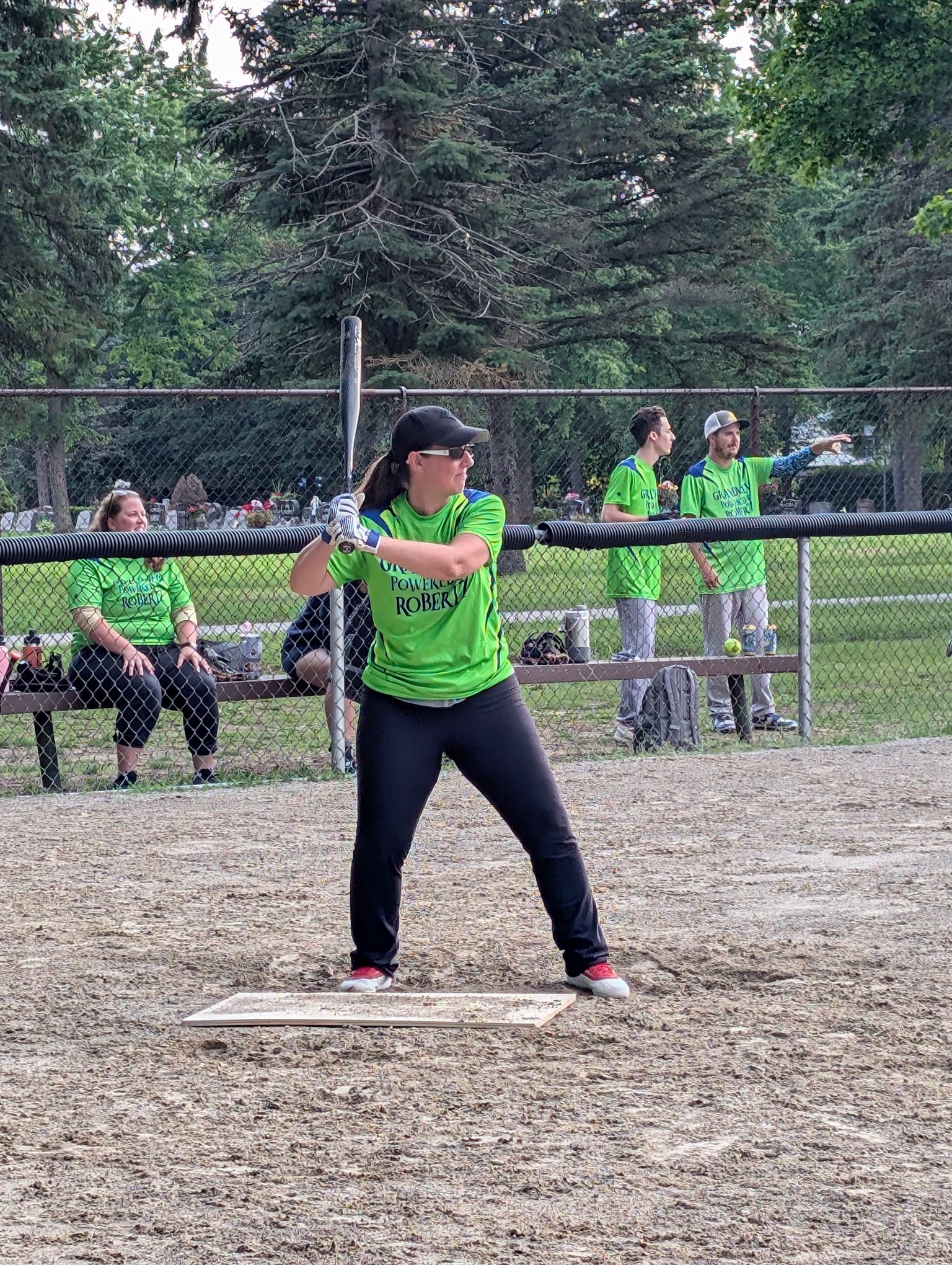 Mandy Stelling at bat during a community softball game in Brantford